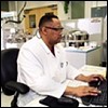 Photo of Scientist Working in Laboratory