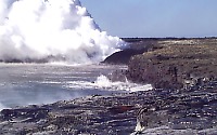 Steam plume and lava entering ocean