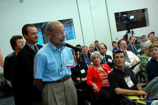 Dr. Murray Goldstein and others line up to make comments during the morning session.