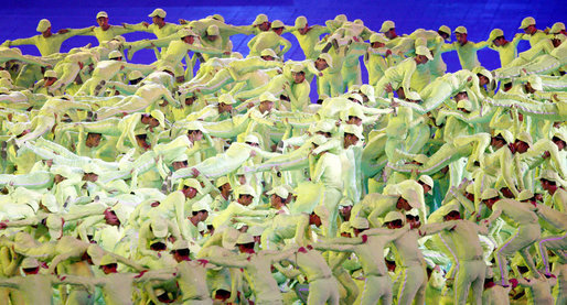 Acrobats perform in bright green costumes at National Stadium Friday, Aug. 9, 2008, during the Opening Ceremonies of the 2008 Summer Olympic Games in Beijing. White House photo by Eric Draper