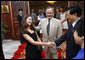 Former President George H. W. Bush introduces his granddaughter, Ms. Barbara Bush, to China's President Hu Jintao Sunday, Aug. 10, 2008, following their visit to Zhongnanhai, the Chinese leaders compound in Beijing. White House photo by Eric Draper