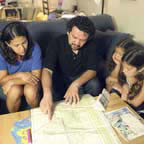 Photo of family making plans to shelter in place
