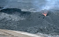 Spatter ejects from cone (episode 55 cone) at base of Pu`u`O`o, Kilauea Volcano, Hawai`i