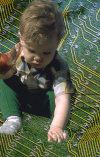 Child Superimposed on a Circuit Board