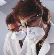 woman and man wearing pleated N95 respirators