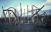 Steel beams of former Waha`ula Visitor Center surrounded by lava flows