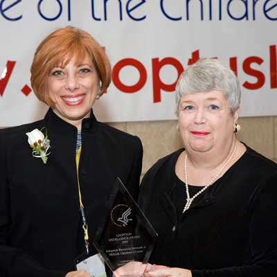 Picture of Joan Ohl with an award recipient