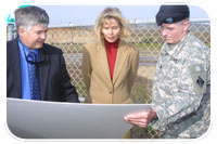 (Left to right) Tom Fayram, Deputy Public Works Director for the Water Resources Division for Santa Barbara County, Congresswoman Lois Capps and Lt. Col Glen Reed, chief of the synchronization group for the USACE L.A. District, discuss work the county has accomplished in the Santa Maria River near the levee. The Corps is currently studying ways to repair the levee in order to provide improved flood protection for the local community.