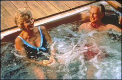 Photo: A man and woman relaxing in a spa.
