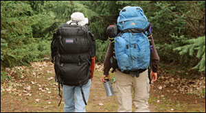 Photo: Two people backpacking
