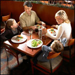 Photo: A family dining in a restaurant