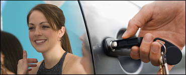 Photo: A girl at prom and a key opening a car door