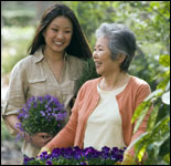 Photo: A mother and daughter in a flower garden