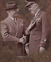 President Truman shaking hands with General George C. Marshall