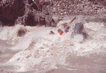 photo of river rafters in rough rapids