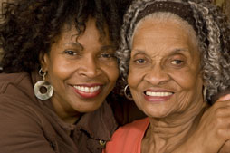 Two smiling women