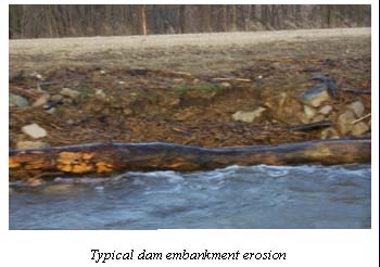 Photo of  a typical dam embankment erosion.