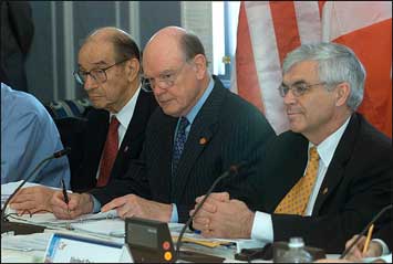 Federal Reserve Board Chairman Alan Greenspan, Treasury Secretary John Snow and Treasury Under Secretary John Taylor participate in a meeting of the G-7 finance ministers and Central Bank governors, April 16