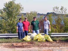 Photo of people Cleaning Up Smithville lake.