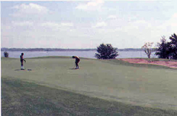 Photo of Golfers at the Lake