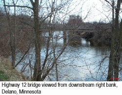 Photo of a bridge. Highway 12 bridge viewed from downstream right bank.