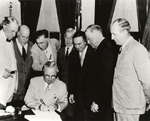 President Harry S. Truman approving an Interim Committee to recommend wartime use of atomic weapons and a postwar policy
