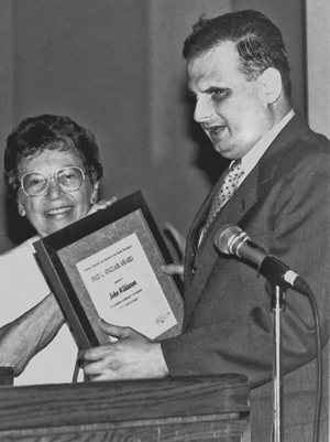 John Wilkinson receiving the Fred L. Sinclair Award in 1994