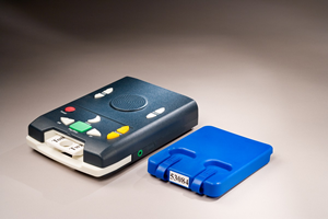 Digital talking book player and mailing container for book.
