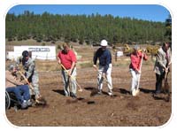 (From left to right) Flagstaff city council member Al White, Deputy Commander for USACE Los Angeles District Lt. Col.  Martha Kiene, Arizona Nevada, Acting Area Engineer Neil Erwin, Alpine Diversified, Inc. owner Lonnie Minor, Council member Karen Cooper and Mayor, Joseph ‘Joe’ C. Donaldson break ground on the first phase of the Rio de Flag Flood Control Project, the Clay Avenue Wash Detention Basin project in Flagstaff, Ariz.