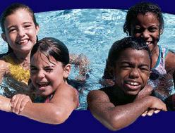 image of 4 kids in a pool smiling