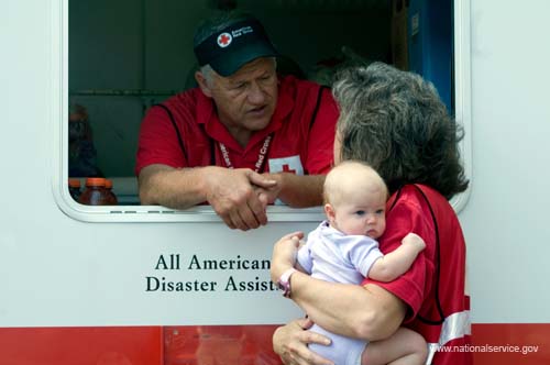 On April 2, 2008, RSVP Disaster Relief Volunteer, Patrick Bos, and his wife, Mary Bos, provide aid at a disaster site in Charleston, South Carolina.