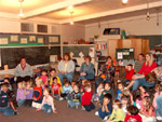 Head Start schoolchildren watching the Ordnance Awareness Safety video (photo courtesy of Mohave Daily News, Neil Young, City Reporter).