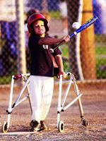 A boy with Cerebral Palsy plays baseball in Scott City Kansas.  Photo by Matthew Huddleston of the Garden City Telegram.