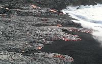 Lava in Mother's Day flow spreads across Highcastle beach, Kilauea volcano, Hawai'i