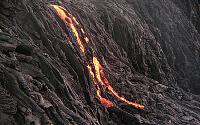 Lava trickles down Highcastle sea cliff in Mother's Day flow, Kilauea volcano, Hawai'i