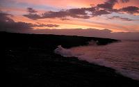 New flow on Highcastle beach barely incandescent at dawn, Kilauea volcano, Hawai'i