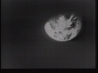 Still frame from the first live TV images of the Earth sent by humans.