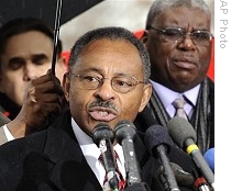 Illinois U.S. Senate appointee Roland Burris makes a statement after departing Capitol Hill in Washington, 6 Jan. 2009