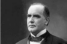 William McKinley, half-length portrait, standing, facing left