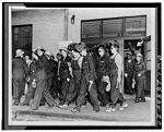 Women welders on the way to their job at the Todd Erie Basin drydock