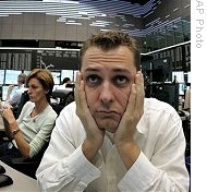 Brokers react at stock market in Frankfurt, Germany (October 2008 file photo)