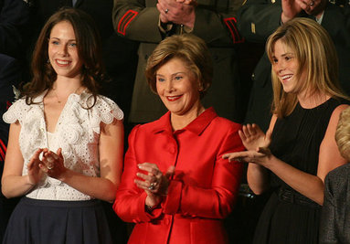 Mrs. Laura Bush, joined by  her daughters, Barbara, left, and Jenna applaud from the First Lady's box at the U.S. Capitol, as President George W. Bush delivers his State of the Union Address Monday, Jan. 28, 2008. White House photo by Joyce N. Boghosian