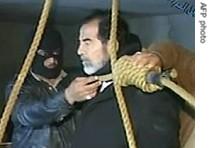 Video still from al-Iraqiya television shows ousted Iraq president Saddam Hussein moments before being hanged in Baghdad, 30 Dec 2006