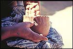 Papai Margarita building a traditional pot