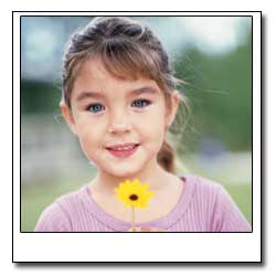 Photo of child with daisy flower
