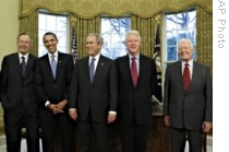 President-elect Barack Obama is welcomed by President George W. Bush at the White House in Washington, with former presidents, from left, George H.W. Bush, Bill Clinton, and Jimmy Carter, 07 Jan 2009