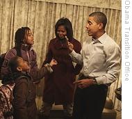 President-elect Barack Obama, Mrs. Michelle Obama and daughters Sasha (7) and Malia (10) at the Hay Adams Hotel in Washington, DC, getting ready for the first day of school, 05 Jan 2009