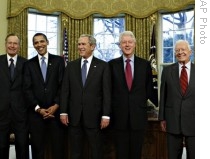 President-elect Barack Obama is welcomed by President George W. Bush at the White House in Washington, with former presidents, from left, George H.W. Bush, Bill Clinton, and Jimmy Carter, 07 Jan 2009 (Click on picture to see larger version)