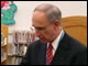 Deputy Secretary Ray Simon distributes books to students at Beaumont Public Library in Beaumont, Texas, as part of the U.S. Department of Education's No Child Left Behind Gulf Coast Summer Reading Initiative with First Book.