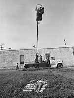 Charles (In Lift), Ray, and Staff Outside Their Office ...